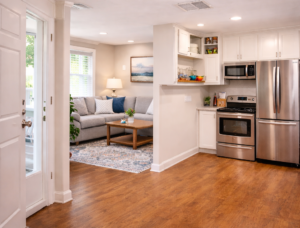 deep clean Bright, clean open-concept living room and kitchen after a professional deep cleaning